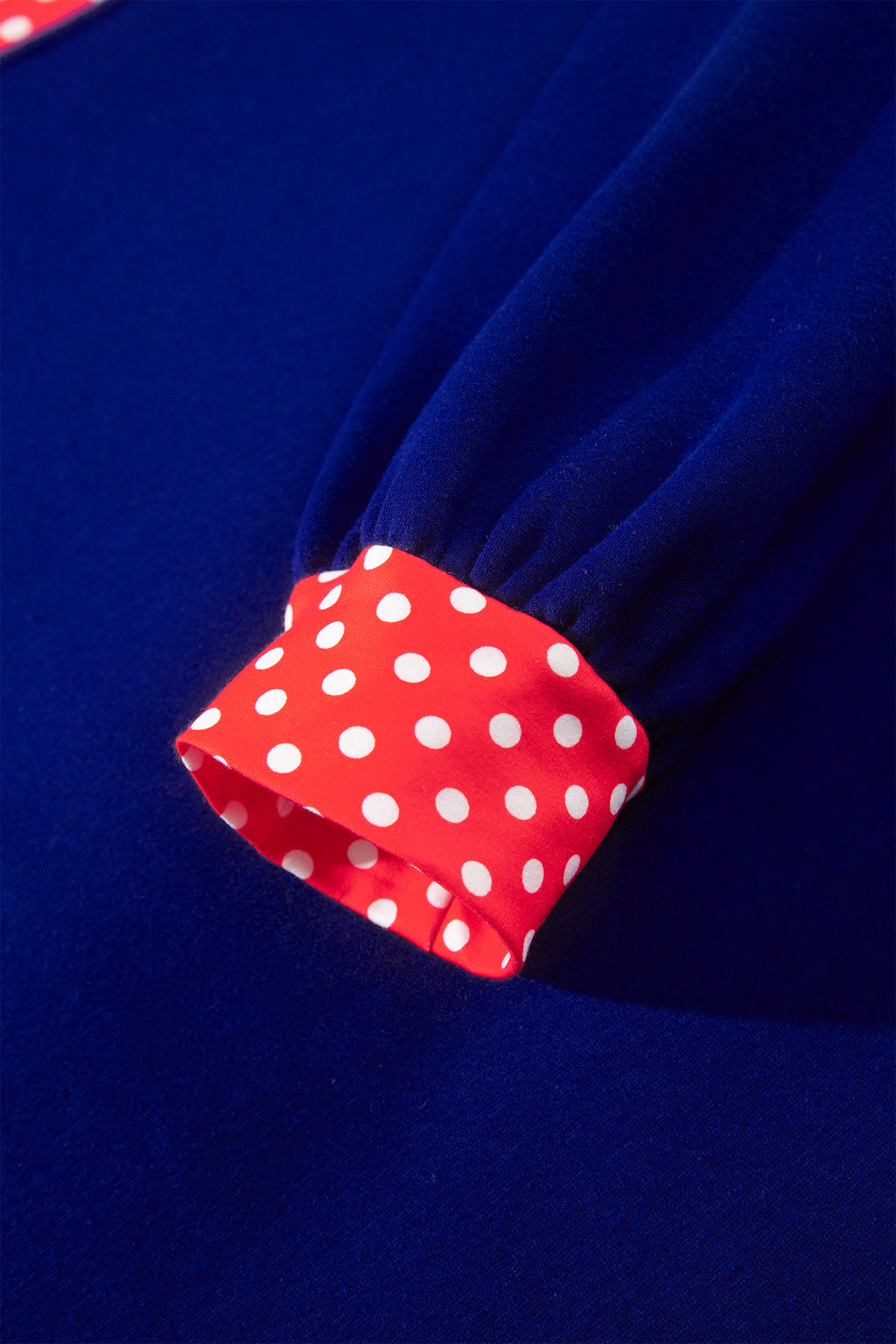 Polka-Dot Contrast-Trim Oversized Mock-Neck Sweatshirt