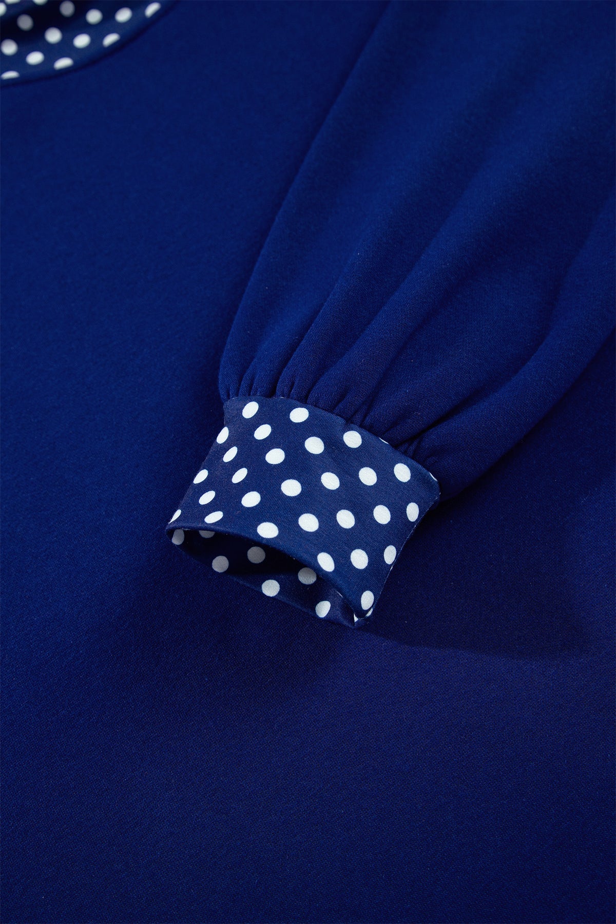 Polka-Dot Contrast-Trim Oversized Mock-Neck Sweatshirt